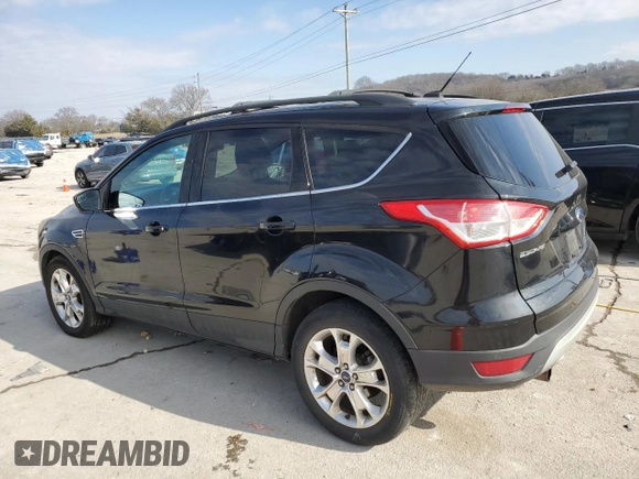 2013 Ford Escape SE with VIN 1FMCU0GX2DUB77759, listed as a Copart auction lot 42611795 with 165,485 mi miles and Salvage Title. Bid and sale history available at DreamBid. Image 2.
