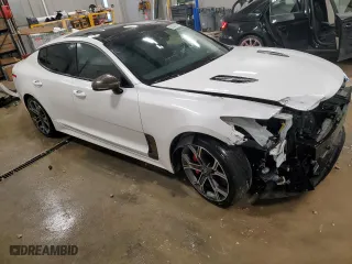 2018 Kia Stinger GT2 with VIN KNAE55LC6J6040346, listed as a Copart auction lot 82428994 with 62,560 mi miles and Salvage Title. Bid and sale history available at carsss.com. Image 4.