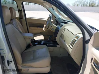 2011 Ford Escape Limited with VIN 1FMCU0E70BKB63399, listed as a IAAI auction lot 41862288 with 238,822 mi miles. Bid and sale history available at carsss.com. Image 5.