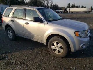 2009 Ford Escape XLS with VIN 1FMCU92709KD07634, listed as a Copart auction lot 42264585 with 155,108 mi miles and Clean title. Bid and sale history available at DreamBid. Image 4.