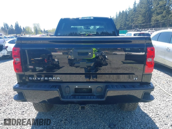 2018 Chevrolet Silverado 1500 LT with VIN 3GCUKREC7JG544365, listed as a IAAI auction lot 42055441 with 57,832 mi miles. Bid and sale history available at carsss.com. Image 16.