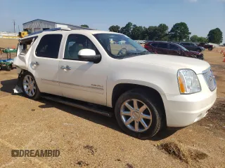 2013 GMC Yukon Denali with VIN 1GKS2EEF9DR311929, listed as a Copart auction lot 63810874 with 122,356 mi miles and Salvage Title. Bid and sale history available at carsss.com. Image 4.