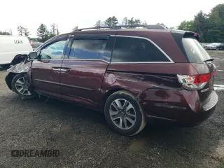 2015 Honda Odyssey Touring Elite with VIN 5FNRL5H98FB033336, listed as a Copart auction lot 57092355 with 186,046 mi miles and Salvage title. Bid and sale history available at DreamBid. Image 2.
