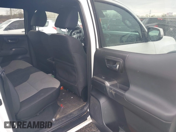 2023 Toyota Tacoma SR with VIN 3TMCZ5AN2PM641846, listed as a IAAI auction lot 41948660 with 21,969 mi miles and . Bid and sale history available at DreamBid. Image 8.