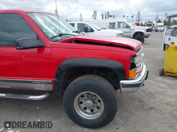 1996 Chevrolet Suburban with VIN 1GNGK26J6TJ327156, listed as a IAAI auction lot 41858544 with 195,532 mi miles. Bid and sale history available at carsss.com. Image 12.