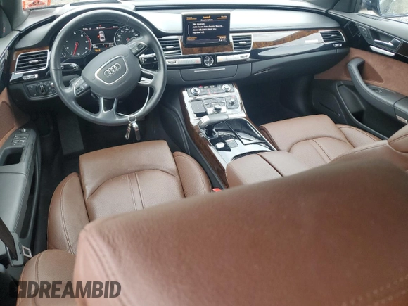 2018 Audi A8 with VIN WAU44AFD0JN000152, listed as a Copart auction lot 62844254 with 47,325 mi miles and Salvage title. Bid and sale history available at DreamBid. Image 8.