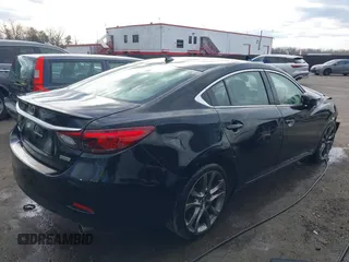 2016 Mazda 6 i Grand Touring with VIN JM1GJ1W54G1454115, listed as a IAAI auction lot 41203298 with 104,632 mi miles and . Bid and sale history available at DreamBid. Image 4.
