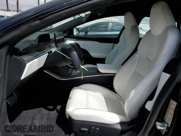 2022 Tesla Model S Plaid with VIN 5YJSA1E69NF460808, listed as a Copart auction lot 48766764 with 12,836 mi miles and Salvage Title. Bid and sale history available at DreamBid. Image 7.