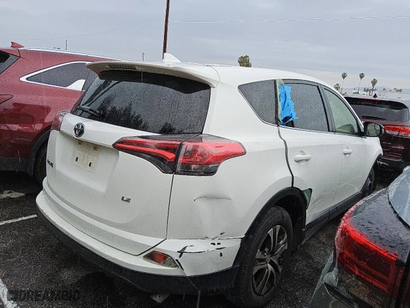 2018 Toyota RAV4 LE with VIN JTMZFREV9JJ180069, listed as a Copart auction lot 44017875 with 74,258 mi miles and Clean Title. Bid and sale history available at carsss.com. Image 3.