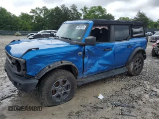 2021 Ford Bronco with VIN 1FMDE5BH9MLB02593, listed as a Copart auction lot 59632675 with 64,833 mi miles and Salvage title. Bid and sale history available at DreamBid. Image 1.