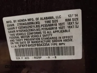 2015 Honda Pilot EX-L with VIN 5FNYF4H52FB043354, listed as a IAAI auction lot 41458416 with 137,137 mi miles and . Bid and sale history available at carsss.com. Image 9.