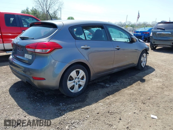 2016 Kia Forte 5-Door LX with VIN KNAFK5A81G5654585, listed as a IAAI auction lot 42103861 with 201,547 mi miles. Bid and sale history available at carsss.com. Image 4.