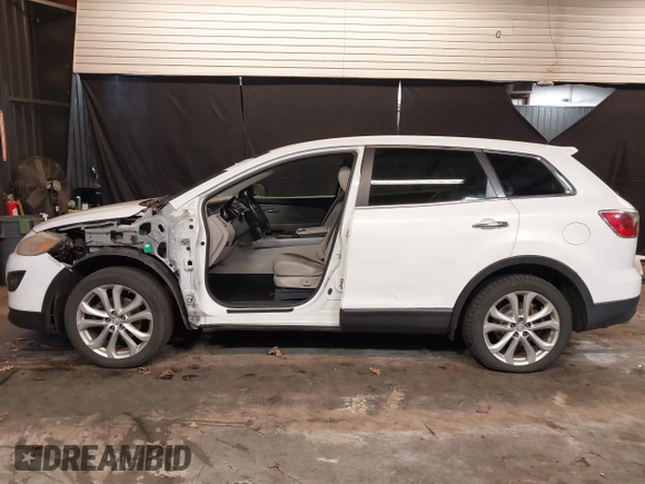 2011 Mazda CX-9 Grand Touring with VIN JM3TB3DV9B0320328, listed as a IAAI auction lot 41708356 with 132,629 mi miles. Bid and sale history available at carsss.com. Image 6.