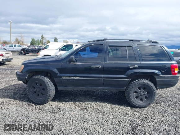 2001 Jeep Grand Cherokee Laredo with VIN 1J4GW48N61C642351, listed as a IAAI auction lot 41783127 with 194,578 mi miles and . Bid and sale history available at DreamBid. Image 14.
