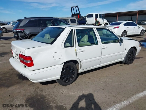 1999 Volvo S70 with VIN YV1LS55A8X1580392, listed as a IAAI auction lot 41623528 with 77,806 mi miles. Bid and sale history available at carsss.com. Image 4.