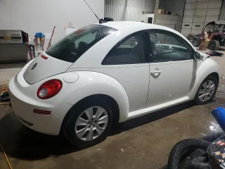2009 Volkswagen New Beetle Coupe S with VIN 3VWRG31C29M516526, listed as a Copart auction lot 84535234 with 57,870 mi miles and Salvage Title. Bid and sale history available at carsss.com. Image 3.