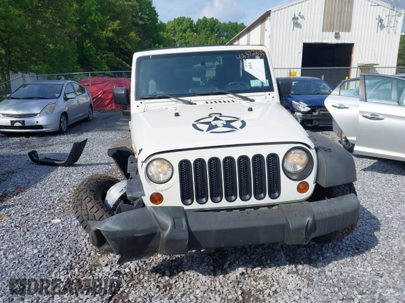 2009 Jeep Wrangler X with VIN 1J4FA24119L727658, listed as a IAAI auction lot 42372855 with 145,450 mi miles and . Bid and sale history available at DreamBid. Image 12.
