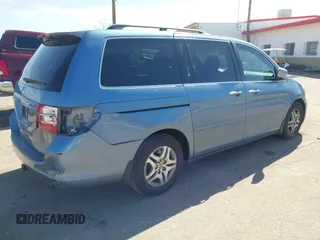 2006 Honda Odyssey EX-L with VIN 5FNRL38796B099851, listed as a IAAI auction lot 41555109 with 154,707 mi miles and . Bid and sale history available at DreamBid. Image 4.