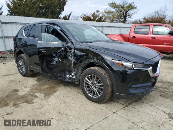 2017 Mazda CX-5 Touring with VIN JM3KFACLXH0195725, listed as a Copart auction lot 47464365 with 65,457 mi miles and Salvage Title. Bid and sale history available at carsss.com. Image 4.
