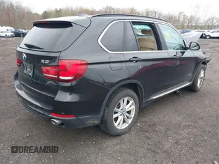 2014 BMW X5 xDrive35i z VIN 5UXKR0C51E0H26528, wystawiony jako IAAI lot #42027626 z przebiegiem 87 228 mil mil oraz . Historia ofert i sprzedaży dostępna na DreamBid. Obrazek 4.