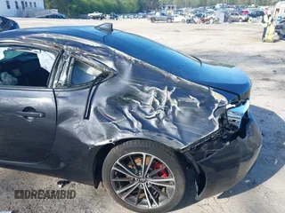 2015 Scion FR-S with VIN JF1ZNAA10F8707671, listed as a IAAI auction lot 42000130 with 136,734 mi miles. Bid and sale history available at carsss.com. Image 6.