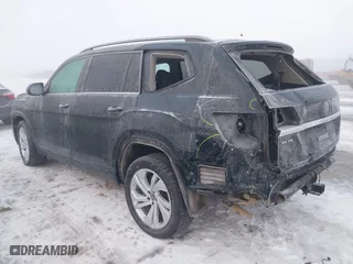 2021 Volkswagen Atlas 3.6L V6 SE w/Technology with VIN 1V2HR2CA9MC574558, listed as a IAAI auction lot 41296583 with 50,267 mi miles. Bid and sale history available at carsss.com. Image 3.