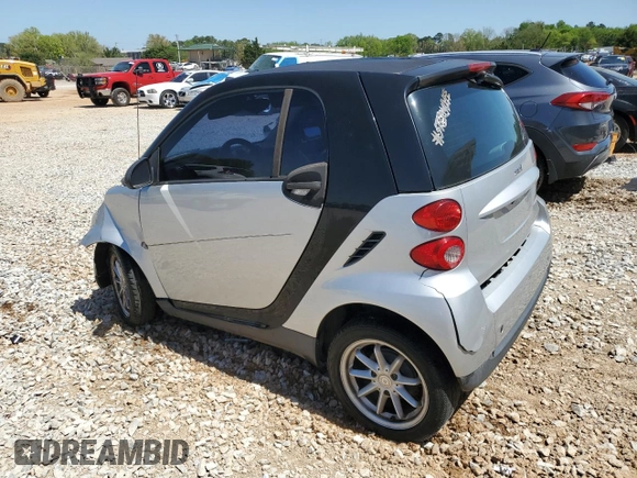 2009 Smart fortwo Pure with VIN WMEEJ31X49K224990, listed as a Copart auction lot 52111335 with 72,317 mi miles and Salvage Title. Bid and sale history available at carsss.com. Image 2.