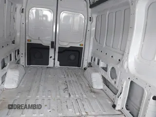 2023 Ford Transit Cargo with VIN 1FTBR2X81PKB38408, listed as a IAAI auction lot 42608271 with 28,384 mi miles and . Bid and sale history available at DreamBid. Image 8.