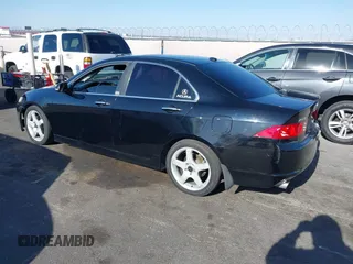 2006 Acura TSX with VIN JH4CL96896C006942, listed as a IAAI auction lot 42262503 with 228,399 mi miles and . Bid and sale history available at DreamBid. Image 3.