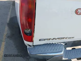 2005 GMC Canyon 1SB SLE Z85 z VIN 1GTCS136958199913, wystawiony jako IAAI lot #41451237 z przebiegiem 178 319 mil mil oraz . Historia ofert i sprzedaży dostępna na DreamBid. Obrazek 18.