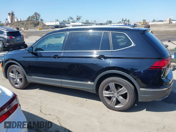 2021 Volkswagen Tiguan SE with VIN 3VV3B7AX1MM045478, listed as a IAAI auction lot 41947899 with 56,694 mi miles and . Bid and sale history available at DreamBid. Image 14.