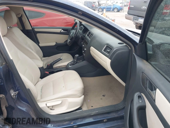 2012 Volkswagen Jetta SE with VIN 3VWDX7AJ3CM394606, listed as a IAAI auction lot 41938597 with 179,316 mi miles and . Bid and sale history available at DreamBid. Image 5.