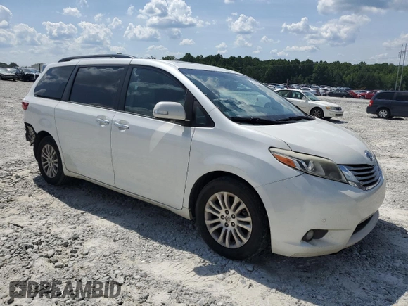 2015 Toyota Sienna XLE with VIN 5TDYK3DC0FS543020, listed as a Copart auction lot 61479225 with 221,814 mi miles and Salvage title. Bid and sale history available at DreamBid. Image 4.