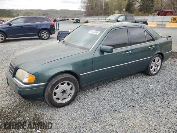 1995 Mercedes-Benz C 230/260/280/320 with VIN WDBHA28E3SF241951, listed as a Copart auction lot 50332845 with 236,068 mi miles and Salvage title. Bid and sale history available at DreamBid. Image 1.