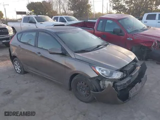 2014 Hyundai Accent GS with VIN KMHCT5AE6EU165851, listed as a IAAI auction lot 41313636 with 161,054 mi miles. Bid and sale history available at carsss.com. Image 1.