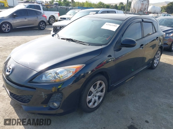 2012 Mazda 3 S Touring with VIN JM1BL1L60C1508750, listed as a IAAI auction lot 42165205 with 103,797 mi miles and . Bid and sale history available at DreamBid. Image 2.