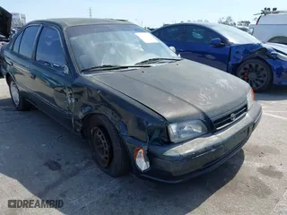 1996 Toyota Tercel DX with VIN JT2BC52L5T0140501, listed as a IAAI auction lot 41728911 with 197,466 mi miles. Bid and sale history available at carsss.com. Image 1.