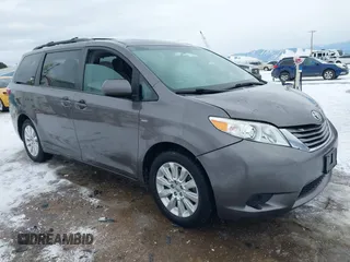 2016 Toyota Sienna LE with VIN 5TDJK3DC6GS142669, listed as a IAAI auction lot 41436771 with 135,715 mi miles. Bid and sale history available at carsss.com. Image 1.