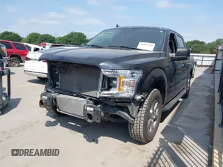 2019 Ford F-150 XL with VIN 1FTEW1CP3KKF31901, listed as a IAAI auction lot 42030790 with 73,771 mi miles and . Bid and sale history available at DreamBid. Image 18.