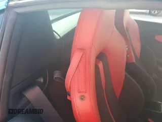 2019 McLaren 570S z VIN SBM13FAA9KW006456, wystawiony jako Copart lot #77400754 z przebiegiem Nie podano mil oraz Nie do naprawy. Historia ofert i sprzedaży dostępna na DreamBid. Obrazek 10.