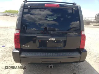 2008 Jeep Commander Sport z VIN 1J8HG48K38C180234, wystawiony jako Copart lot #55959325 z przebiegiem 198 459 mil mil oraz Szkoda całkowita • Salvage title. Historia ofert i sprzedaży dostępna na DreamBid. Obrazek 6.