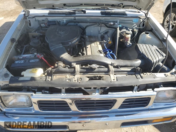 1996 Nissan Frontier XE z VIN 1N6SD11Y5TC327761, wystawiony jako Copart lot #79662594 z przebiegiem 151 631 mil mil oraz Szkoda całkowita • Salvage title. Historia ofert i sprzedaży dostępna na DreamBid. Obrazek 11.