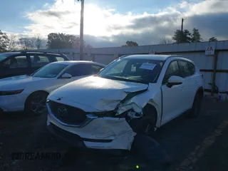 2020 Mazda CX-5 Sport with VIN JM3KFABMXL1824574, listed as a IAAI auction lot 41029057 with 47,760 mi miles. Bid and sale history available at carsss.com. Image 17.