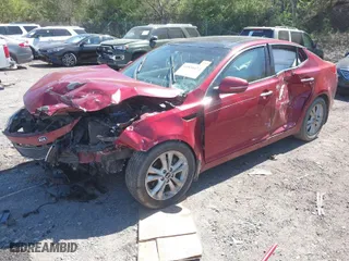 2011 Kia Optima EX with VIN KNAGN4A74B5109910, listed as a IAAI auction lot 41856472 with 212,227 mi miles. Bid and sale history available at carsss.com. Image 2.