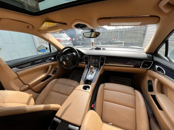 2013 Porsche Panamera z VIN WP0AA2A74DL016182, wystawiony jako Copart lot #89269425 z przebiegiem 119 089 mil mil oraz Czysty tytuł • Clean title. Historia ofert i sprzedaży dostępna na DreamBid. Obrazek 9.