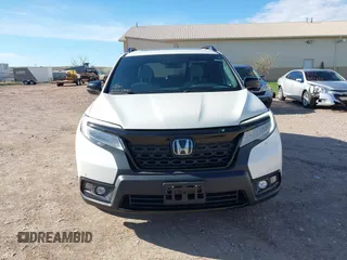 2019 Honda Passport Elite z VIN 5FNYF8H0XKB001472, wystawiony jako IAAI lot #42143890 z przebiegiem 98 119 mil mil oraz . Historia ofert i sprzedaży dostępna na DreamBid. Obrazek 13.