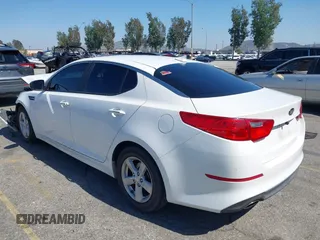 2015 Kia Optima LX z VIN KNAGM4A71F5594595, wystawiony jako IAAI lot #42226773 z przebiegiem 133 194 mil mil oraz . Historia ofert i sprzedaży dostępna na DreamBid. Obrazek 3.