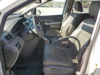 2016 Honda Odyssey Touring Elite with VIN 5FNRL5H9XGB006981, listed as a Copart auction lot 63970385 with 165,164 mi miles and Salvage title. Bid and sale history available at DreamBid. Image 7.