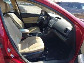 2009 Mazda 6 i Grand Touring with VIN 1YVHP82A495M04111, listed as a IAAI auction lot 42031522 with 251,839 mi miles. Bid and sale history available at carsss.com. Image 5.