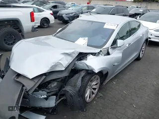 2017 Tesla Model S 100D with VIN 5YJSA1E24HF193563, listed as a IAAI auction lot 42120120 with 60,391 mi miles and . Bid and sale history available at DreamBid. Image 25.